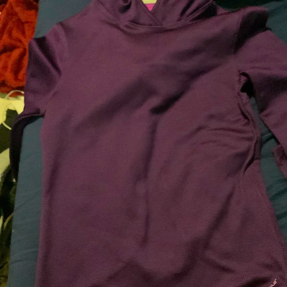 Dark purple tight fit has thumb holes